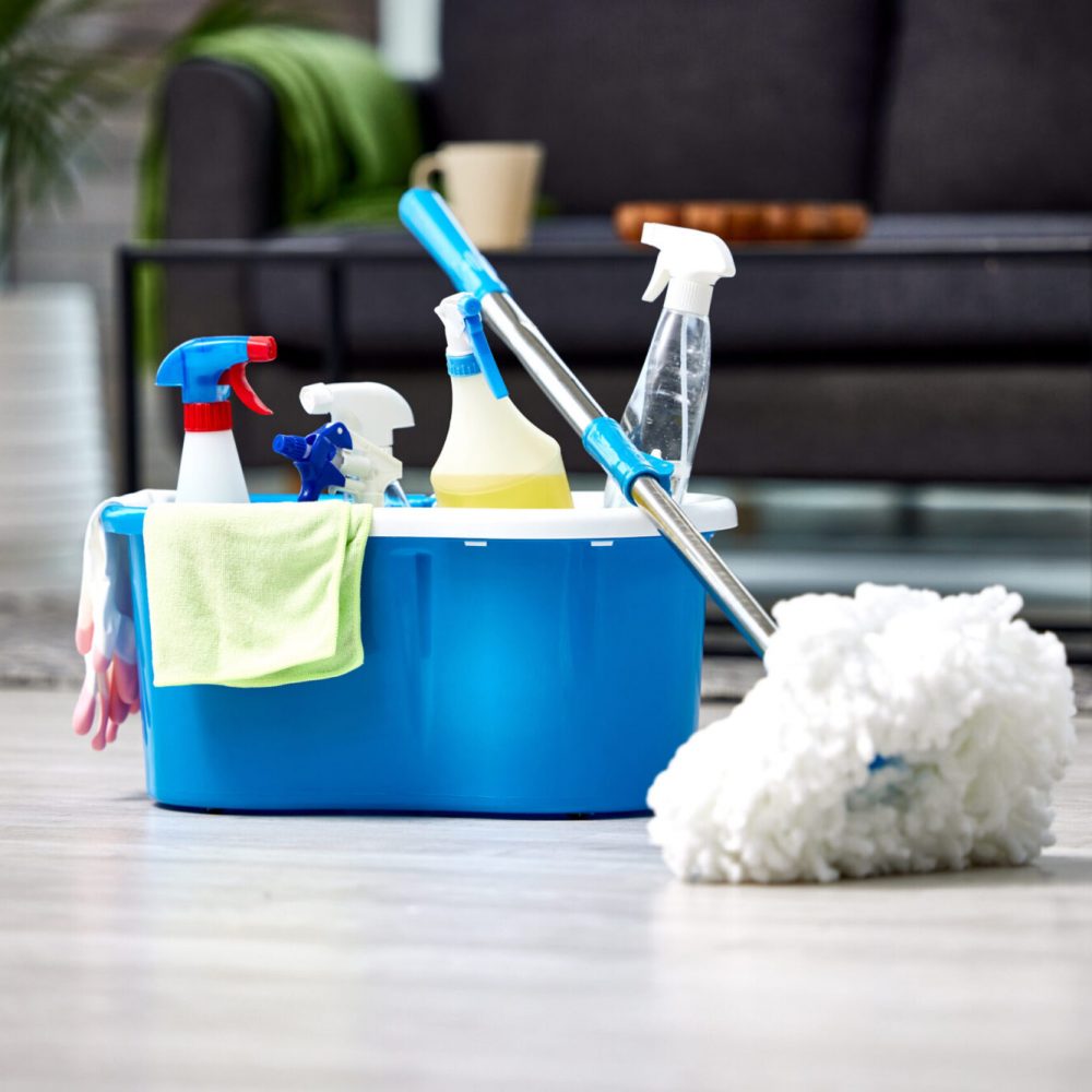 Making my floors sparkle. Shot of a bucket of cleaning supplies